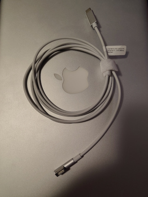 A two metre USB-C to original Magsafe cable, plugged into a normal USB-C charger.